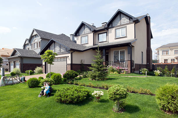 new building luxury suburban house in sunny summer afternoon. House hunting